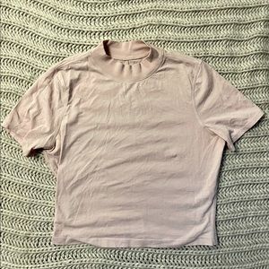 Lululemon high neck crop top in baby pink